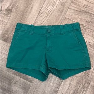 Teal shorts with adjustable sides